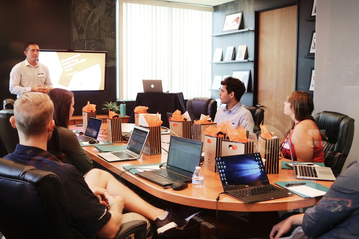 Corporate conference room environment during a management planning discussion